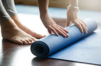 yoga pose rolling mat